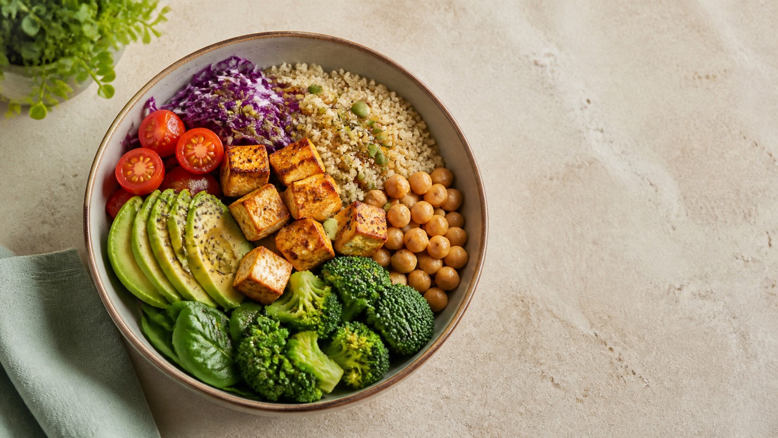 Protein and fiber after 40 in a vegetarian bowl with tofu, chickpeas, quinoa and vegetables