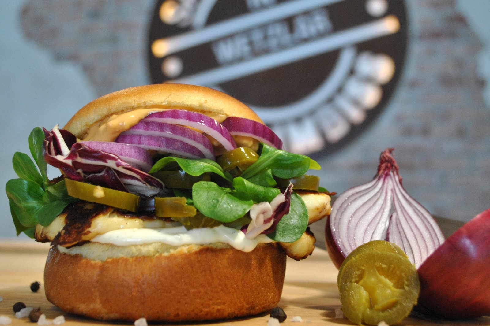 Vegetarian burger served with fresh toppings.