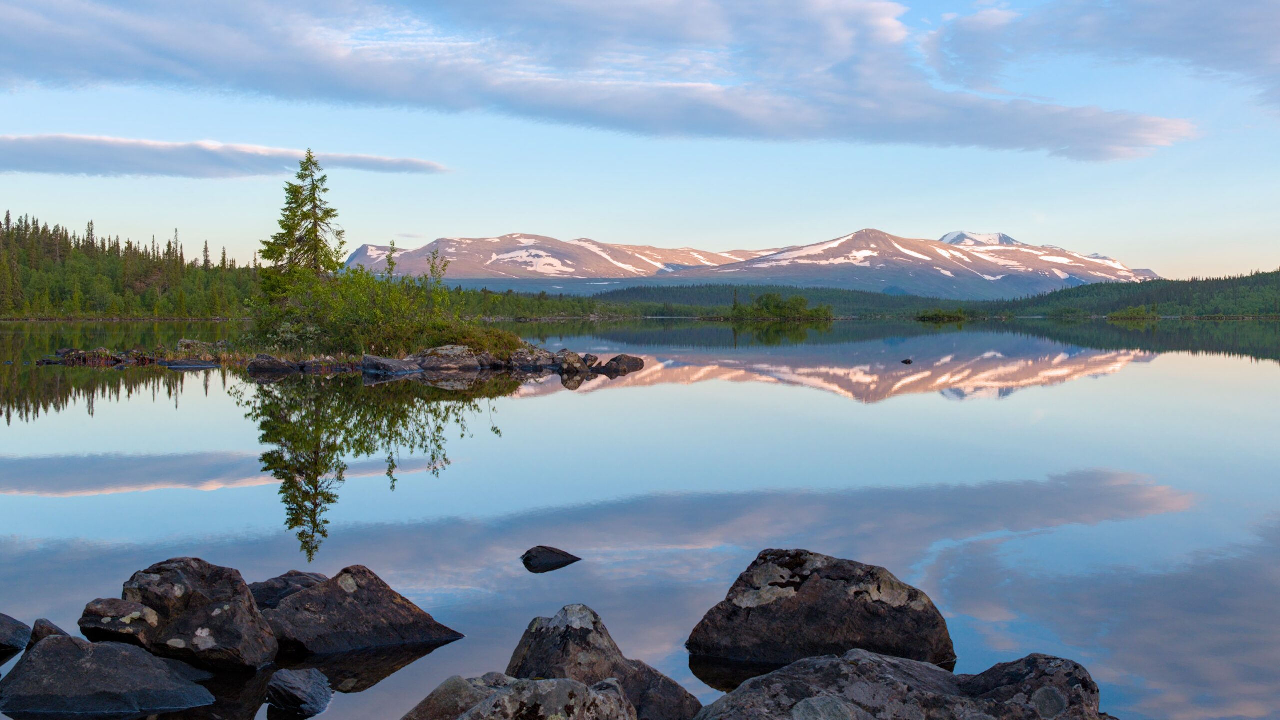 A golden-hour trail through a Nordic landscape, representing different aging journeys after 40